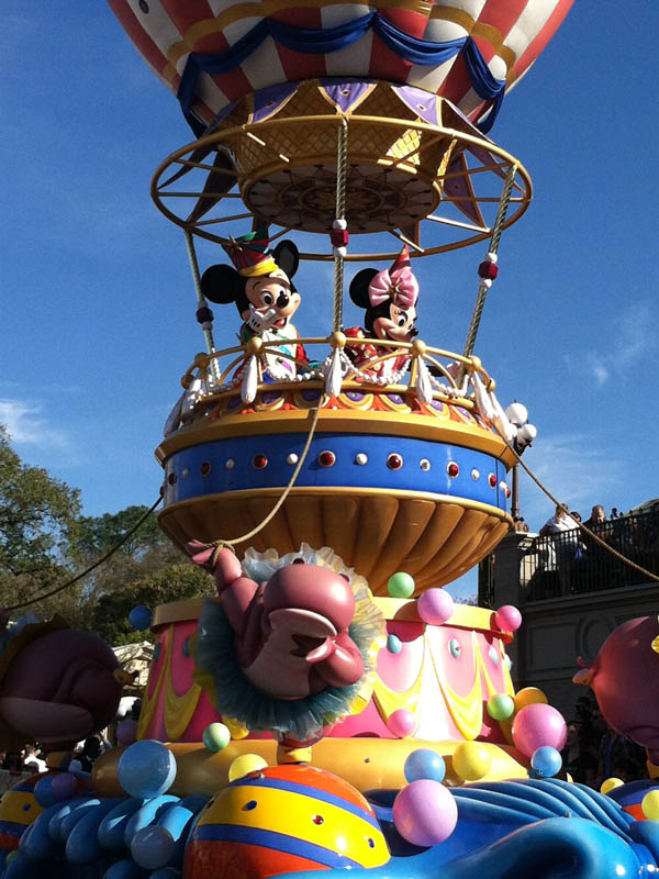 Mickey and Minnie float in Festival of Fantasy Parade